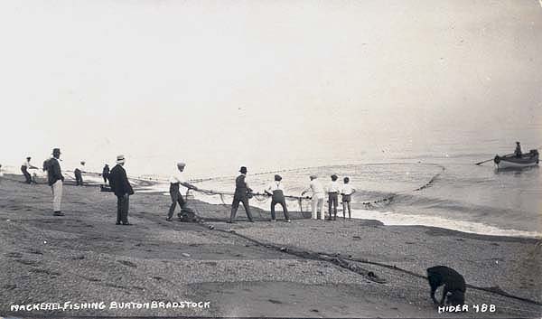 Tom Ward's fishing crew hauling in the Seine net with the Lerrett nearby c1930