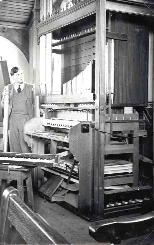 Michael Dittmer dismantling the old 'positive' organ 