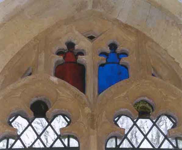 The east window was replaced in the 15C and a small amount of the original yellow glass of that period still remains in the heads of the lower lights