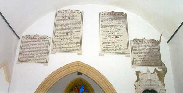 Over the chancel arch can be seen four 19C stone panels of the Creed, the Ten Commandments, and the Lord's Prayer.