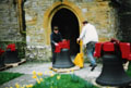 Andrew and his helpmate tackle the tricky task of wheeling one of the bells back into the church.